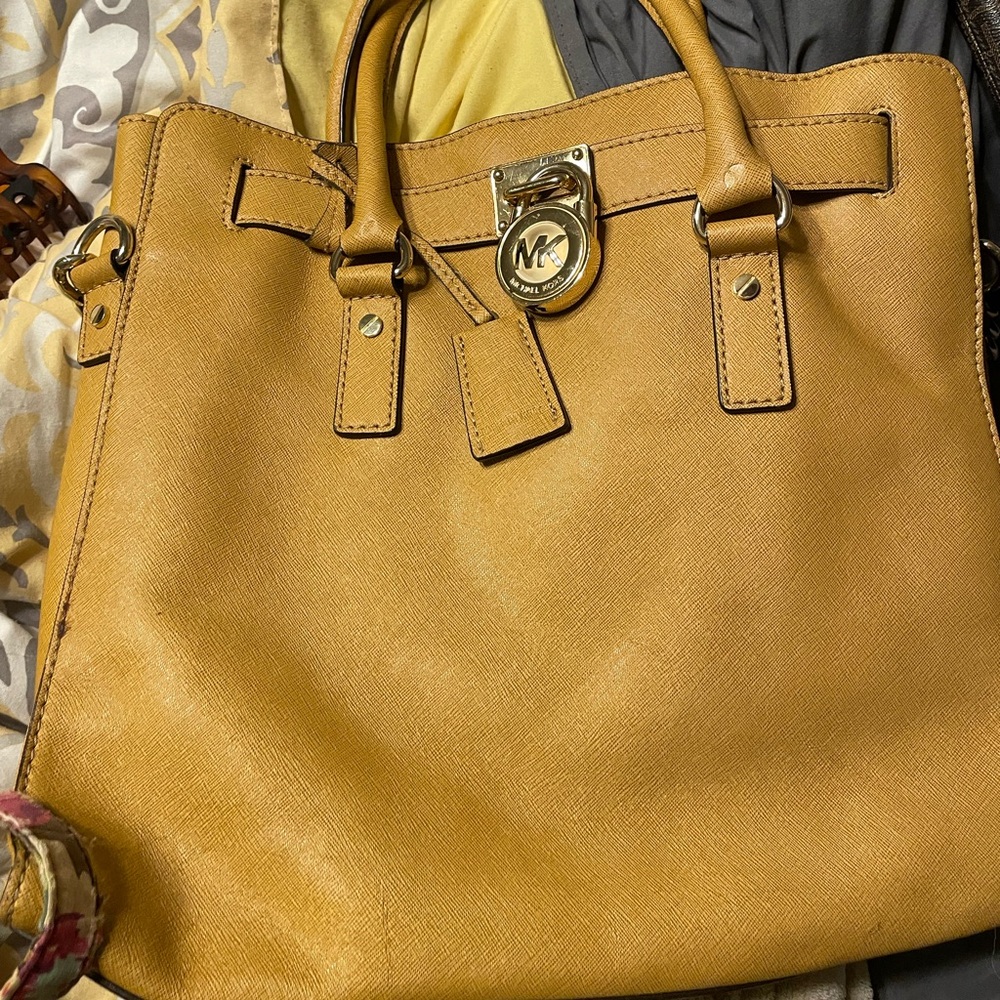 Calvin Klein tan purse.